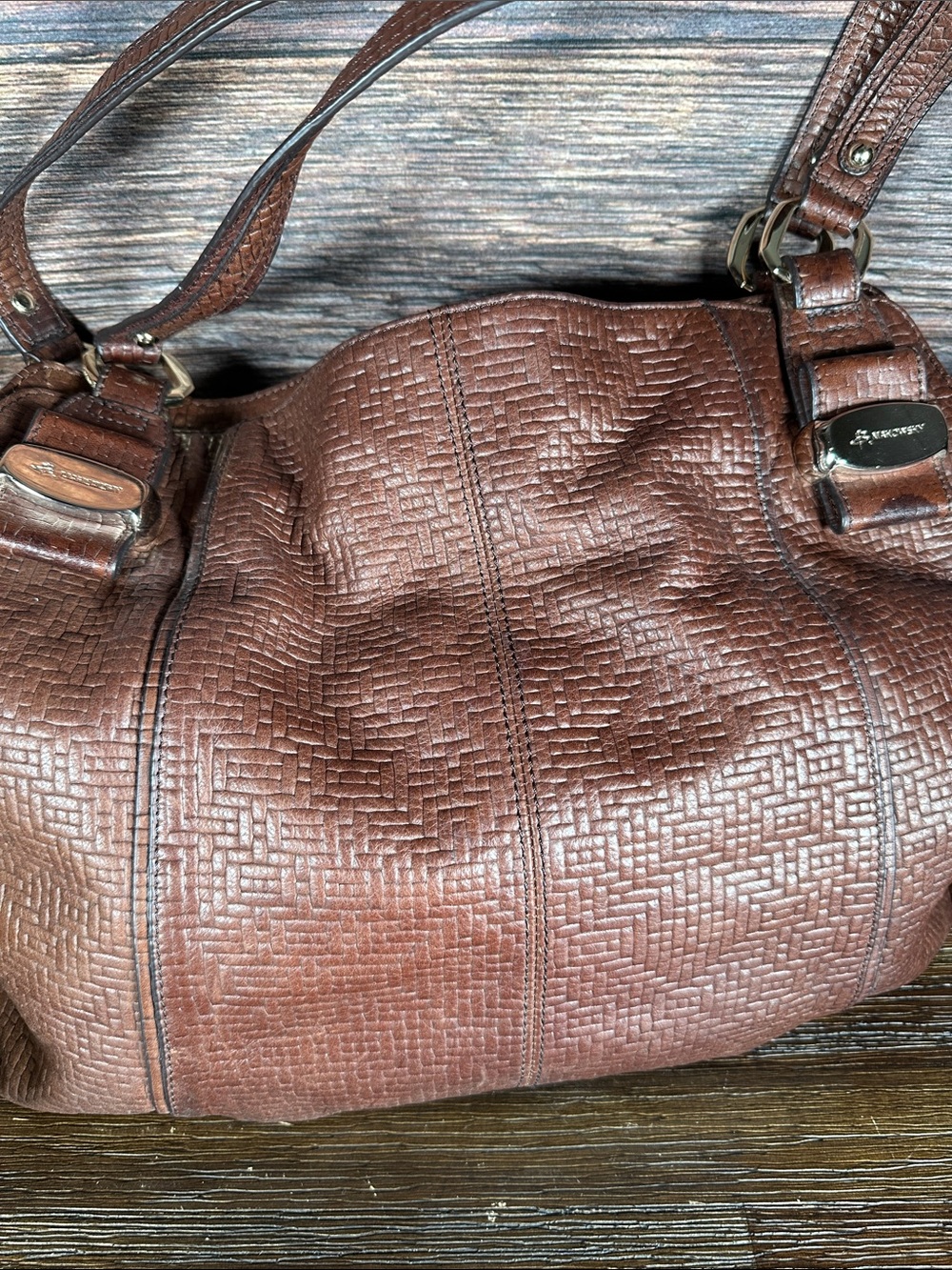 B. Makowsky brown leather shoulder bag with a textured, woven embossed pattern. - Picture 2 of 10
